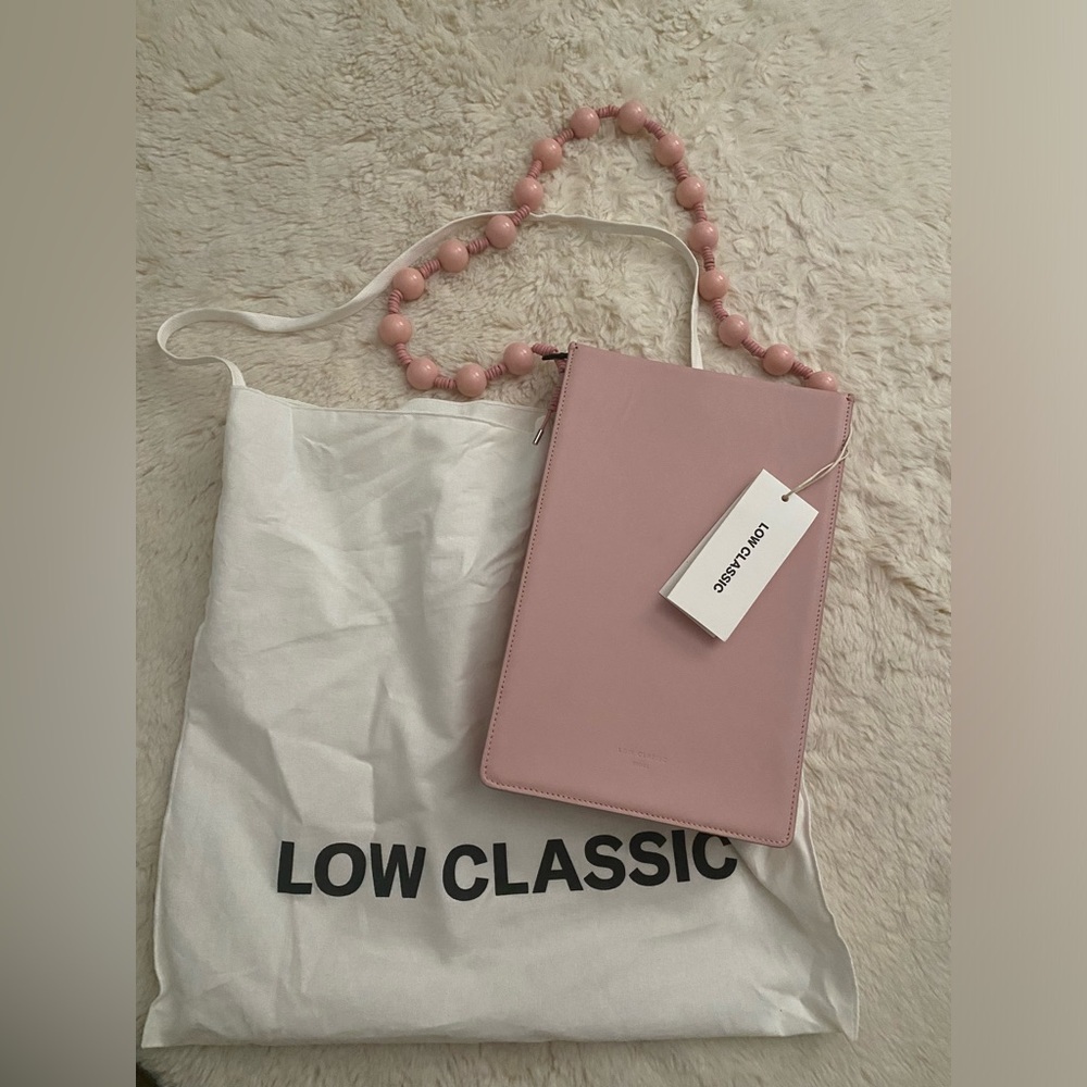 Low Classic
beaded top handle leather shoulder bag